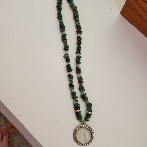 Kirk's Folly  Seaview Moon face necklace